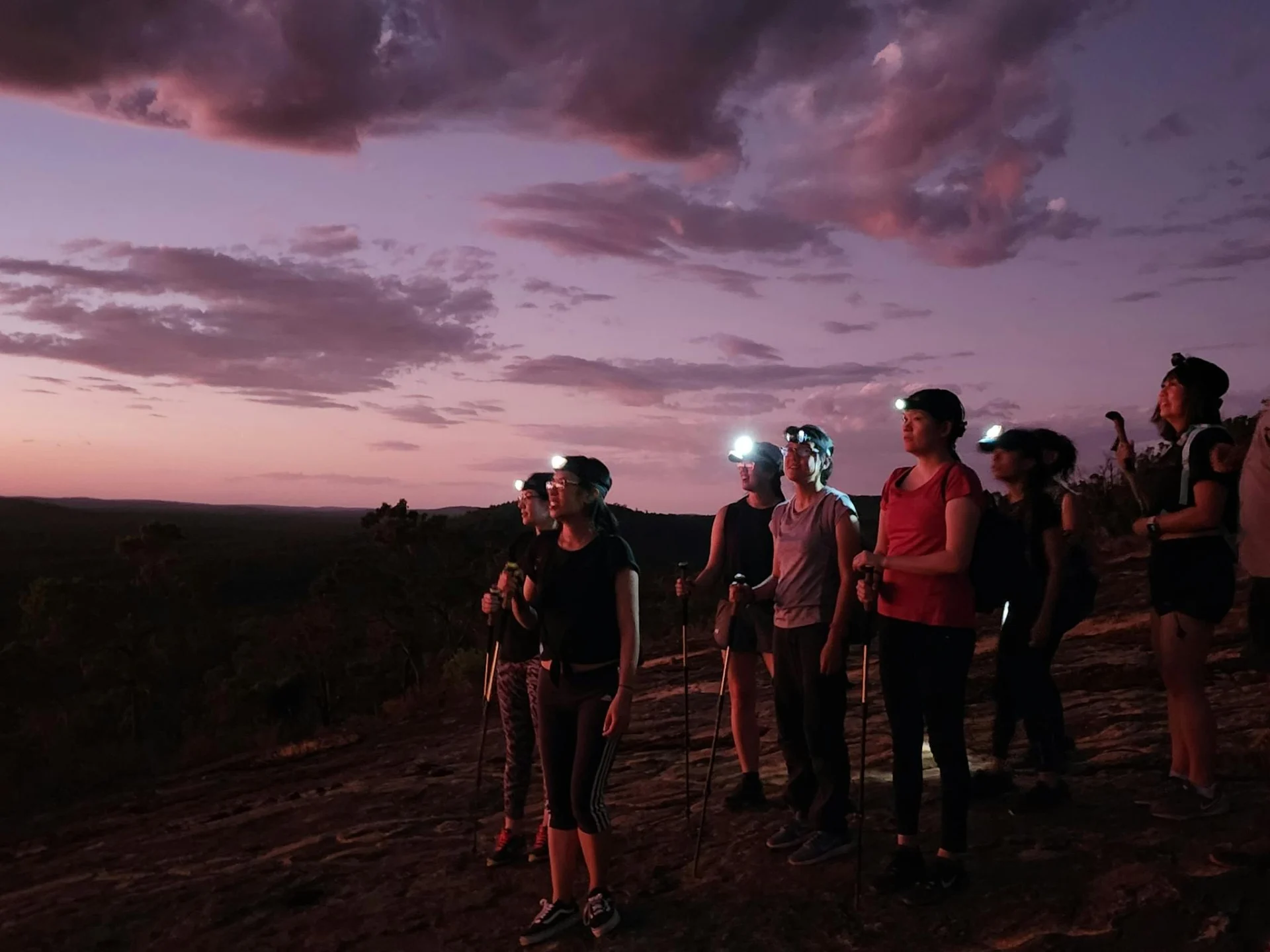 Hikers enjoying twilight hike on Bibbu