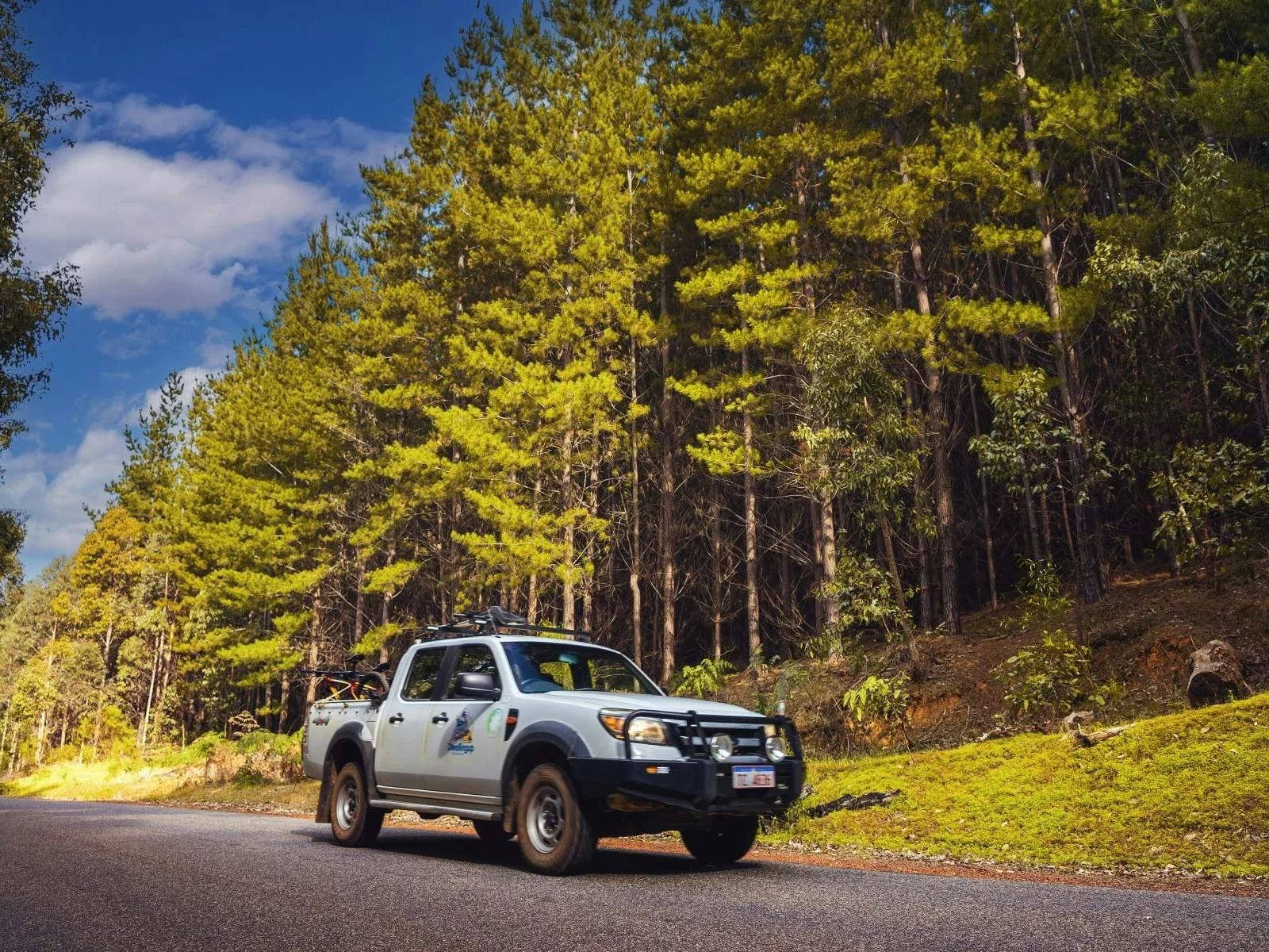 4WD driving on sealed road in Lane Poole Reserve