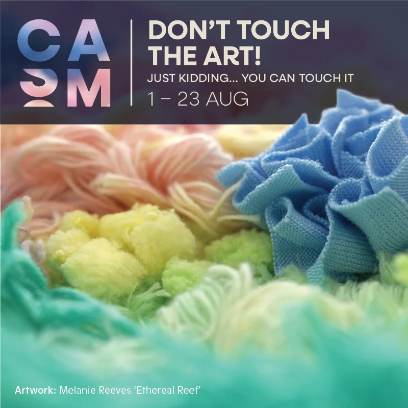 Close-up of colorful, textured fabric resembling coral. Text reads: DONT TOUCH THE ART! Just kidding... you can touch it. 1–23 Aug. Artwork credit: Melanie Reeves, ‘Ethereal Reef’.