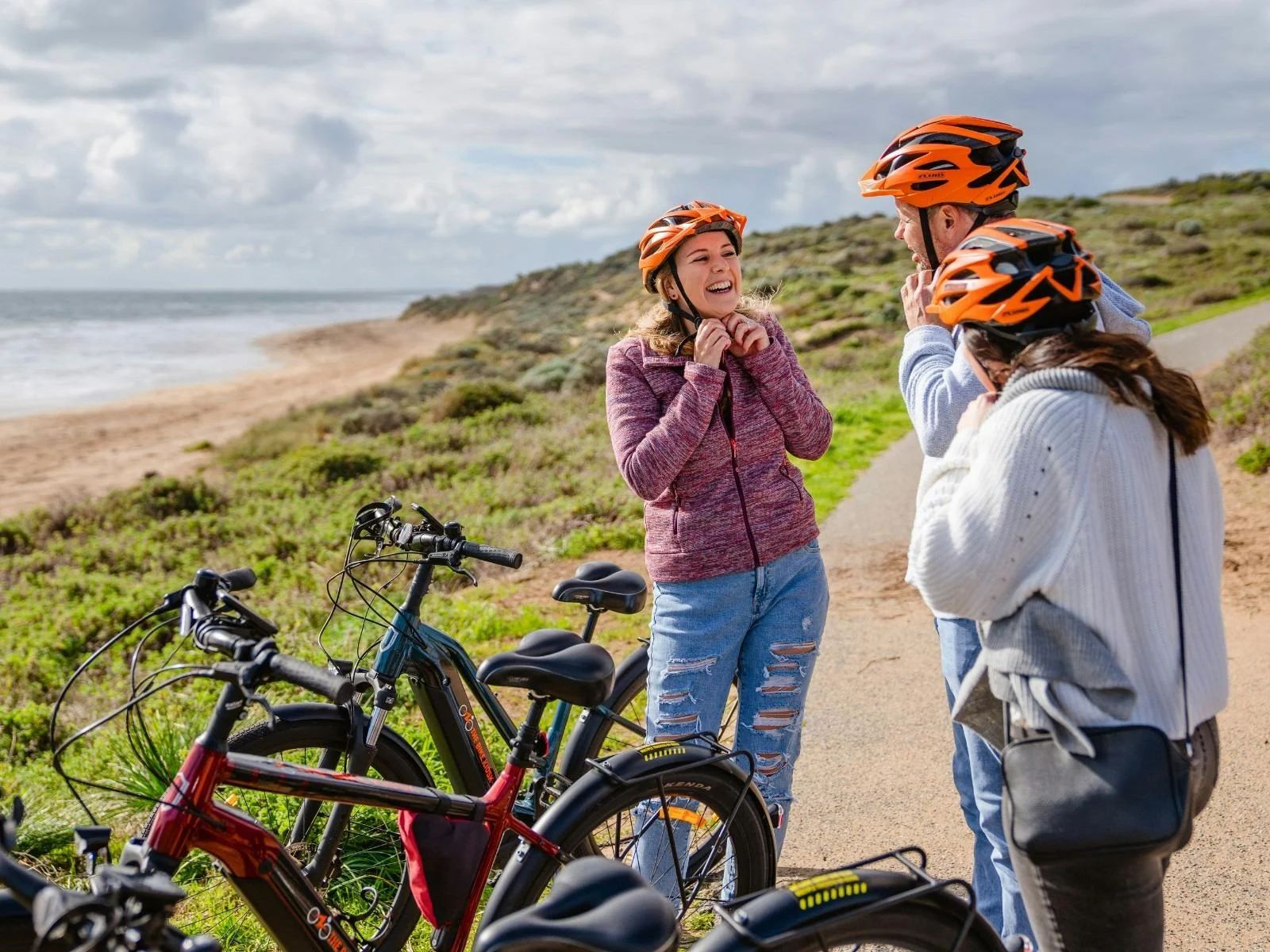 Small group enjoying a guided ebike ride along Mandurah's scenic coastline