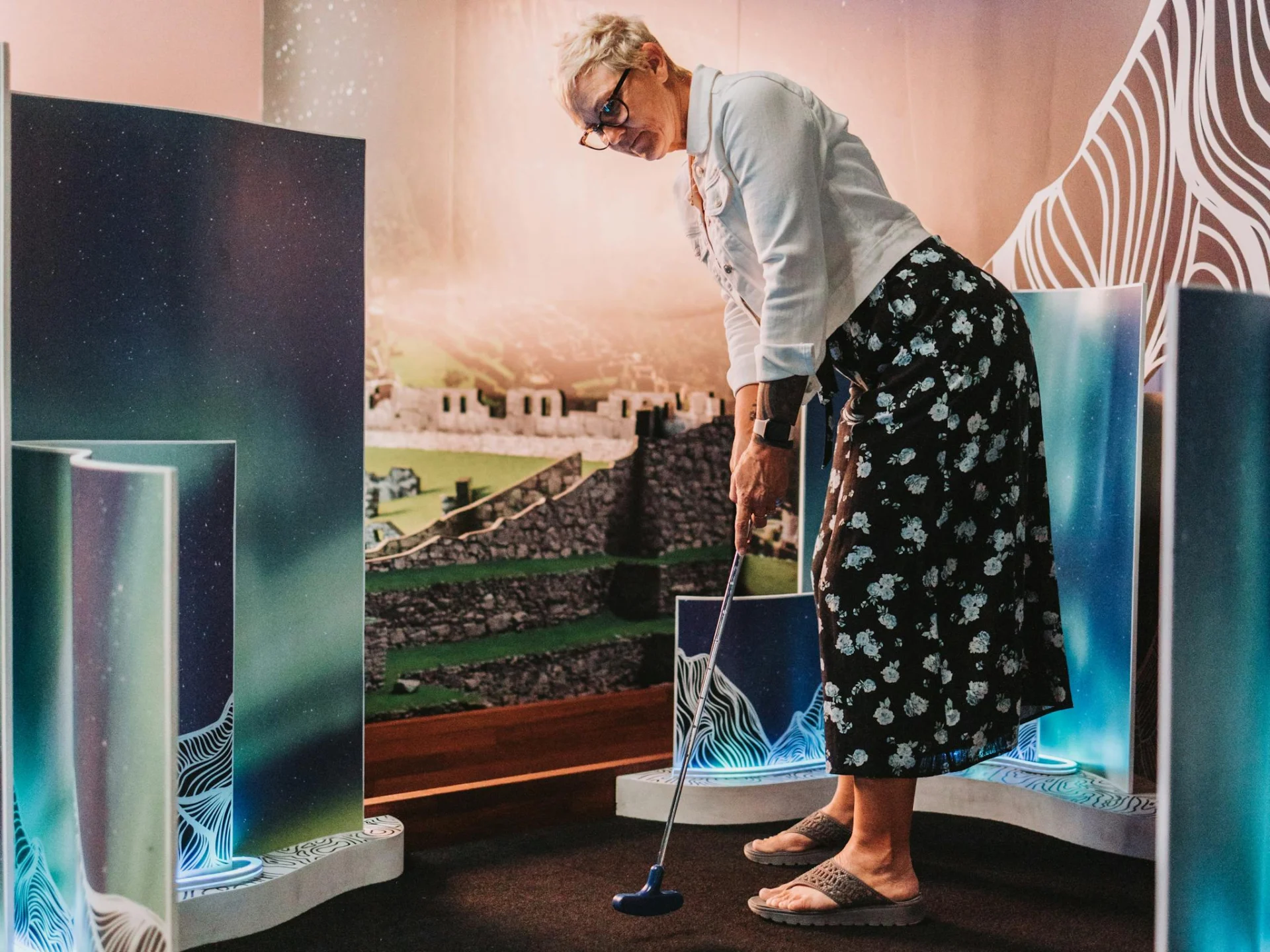 Woman Playing On A Hey Caddy Golf Course
