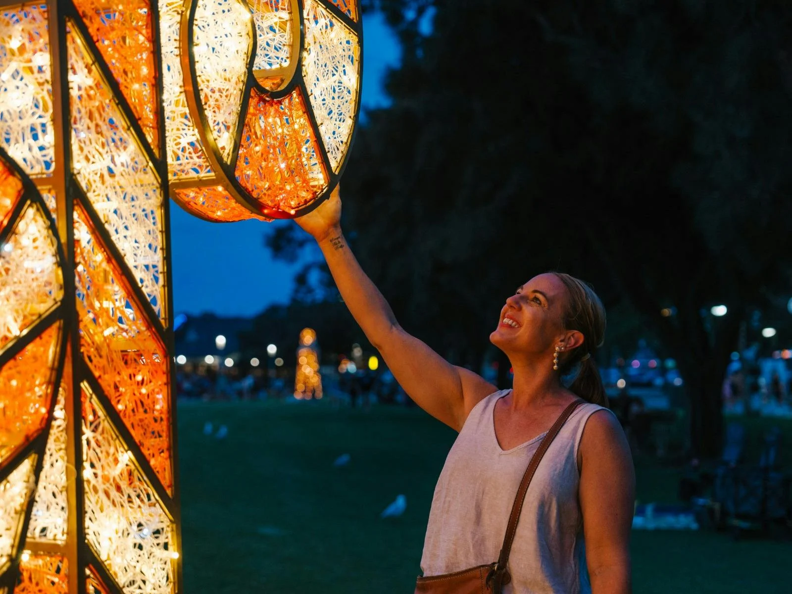 Adult female enjoying the candy cane christmas lights