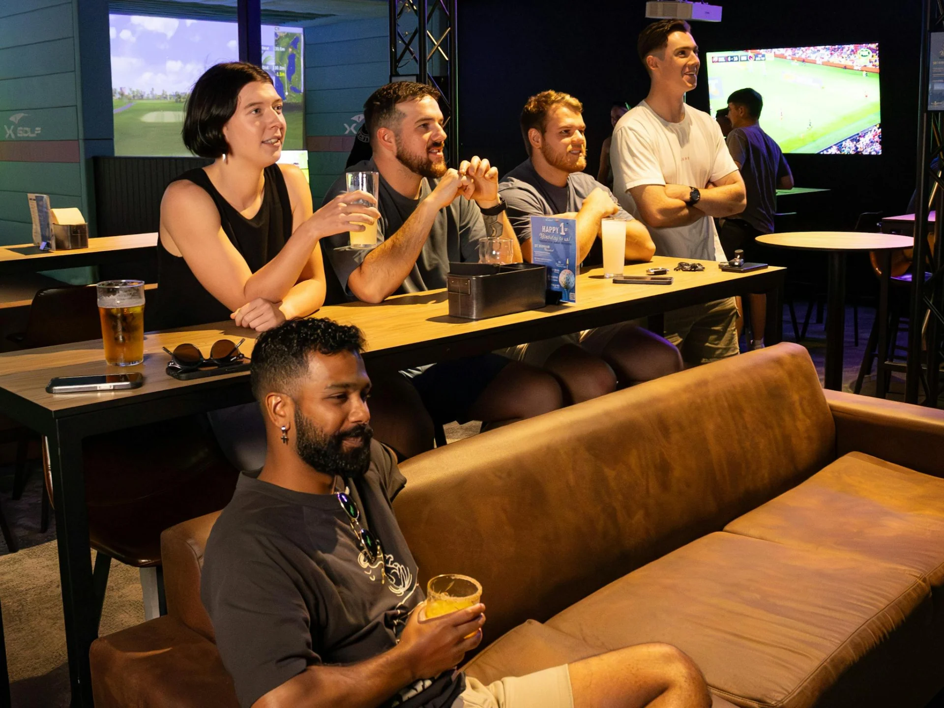 People Watching and Lounging Virtual Golf at X-Golf Rockingham