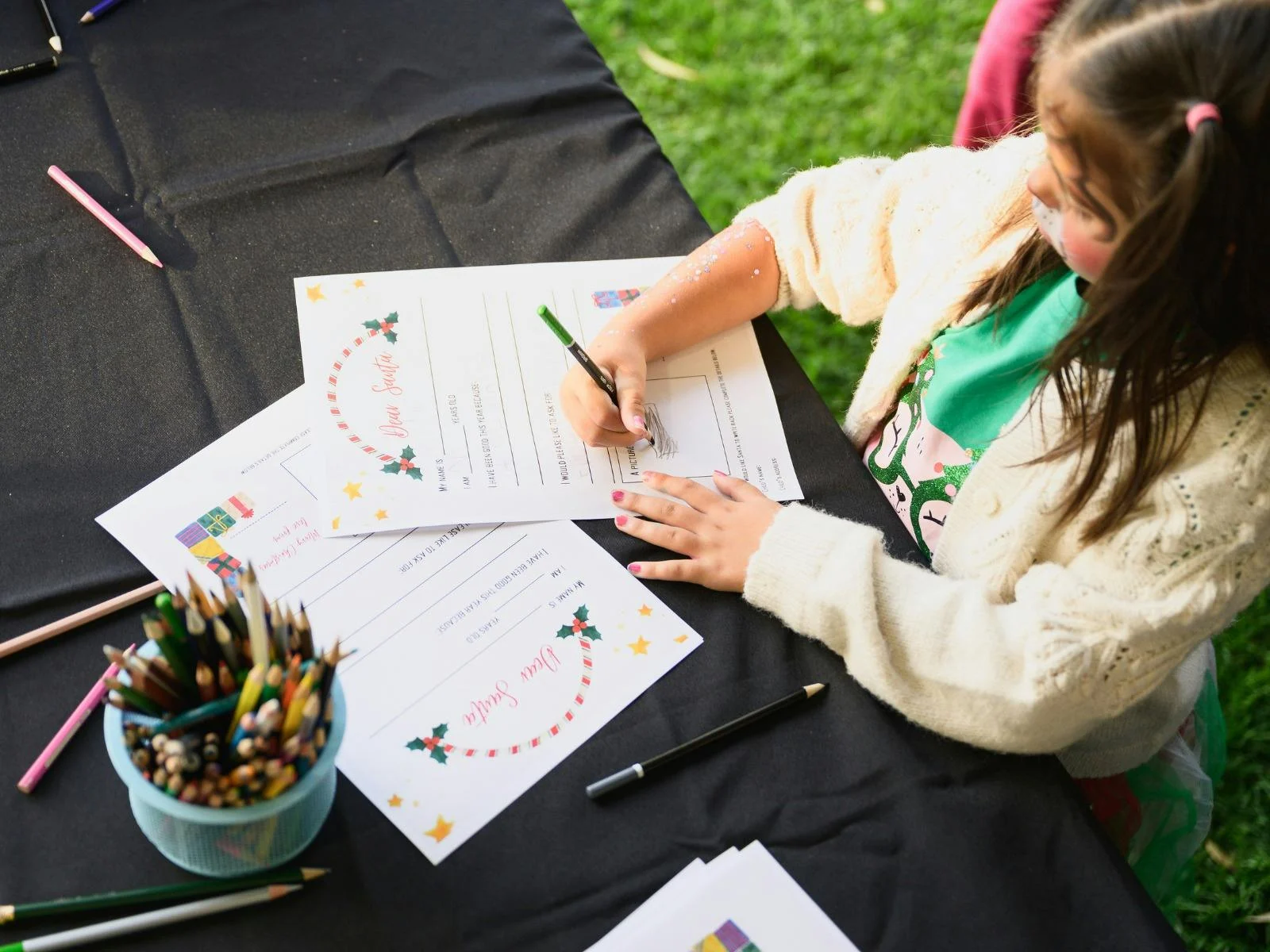 Child writing a letter to santa