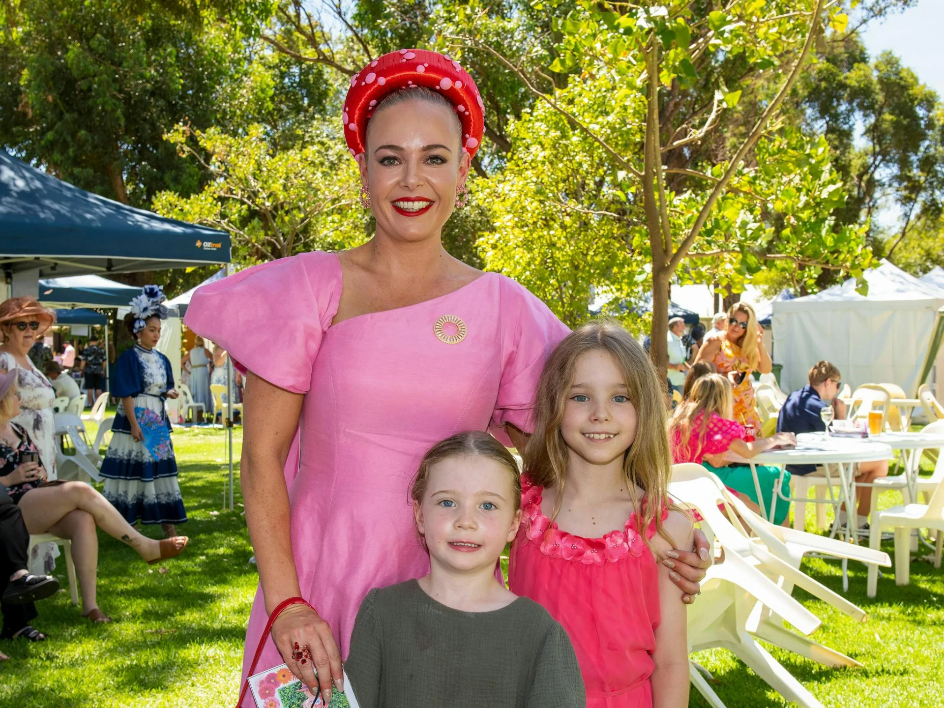 Fashions on the Field entrant with children at Pinjarra Park